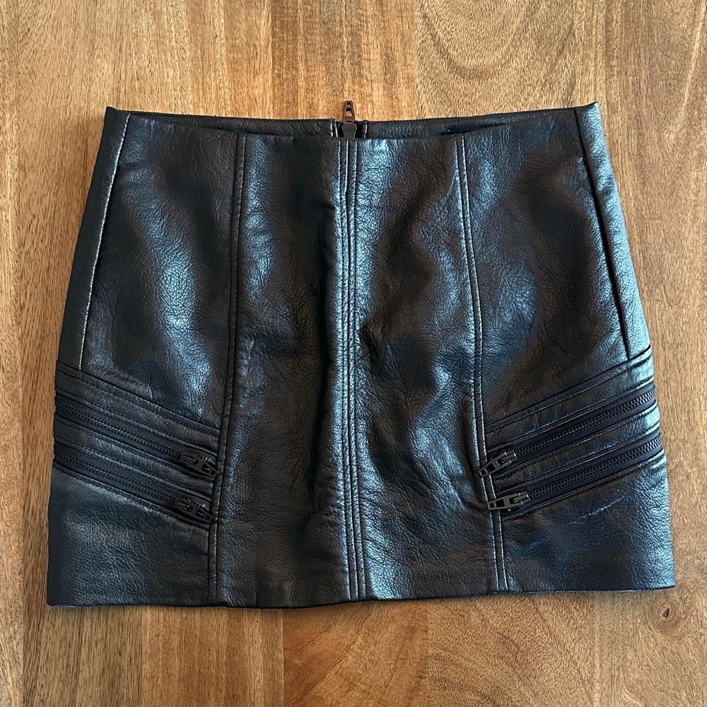 Blank NYC Black Faux Leather Mini Skirt with Zipper Detail